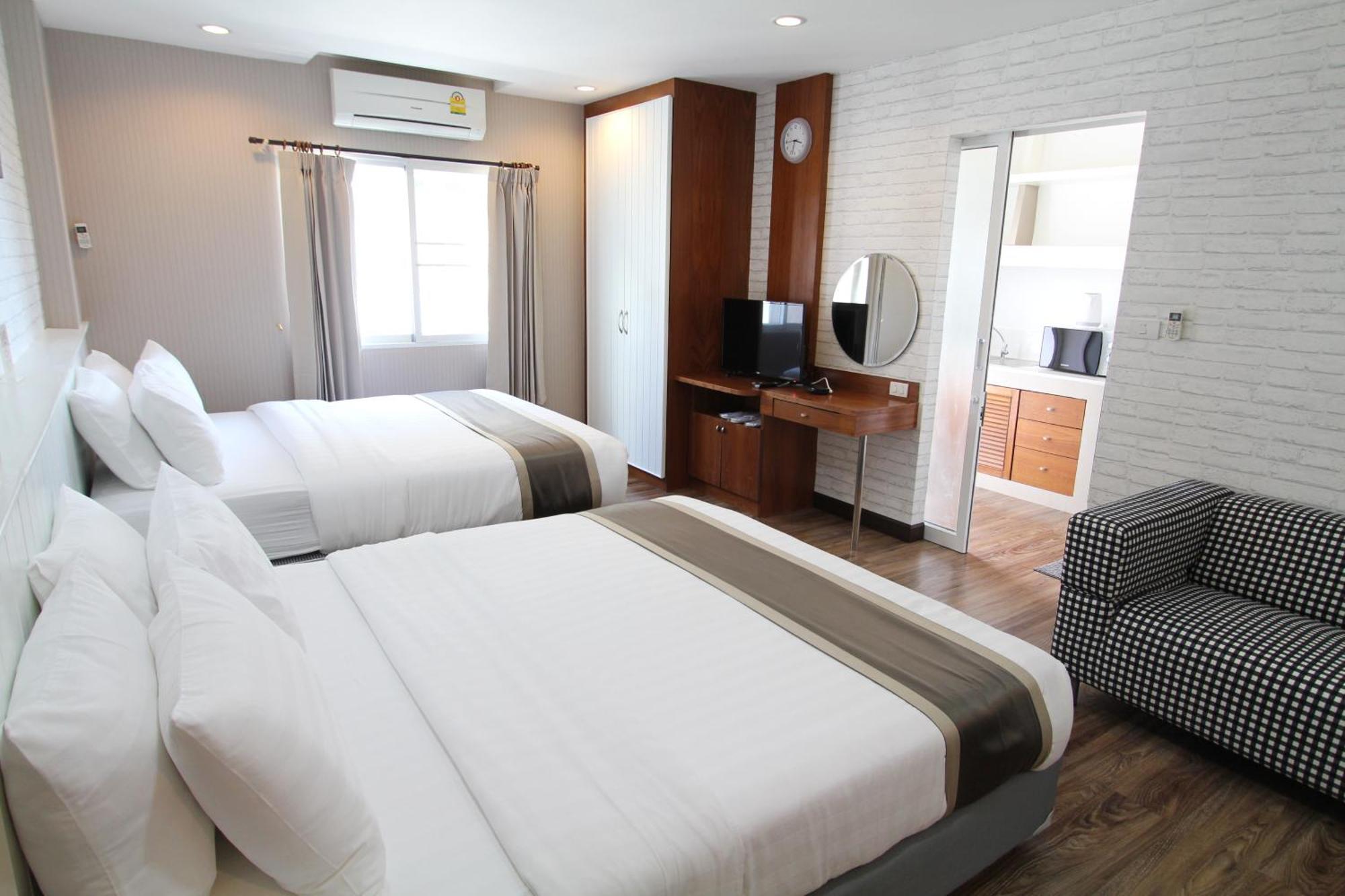 Rom Executive med 2 queen-size-senger