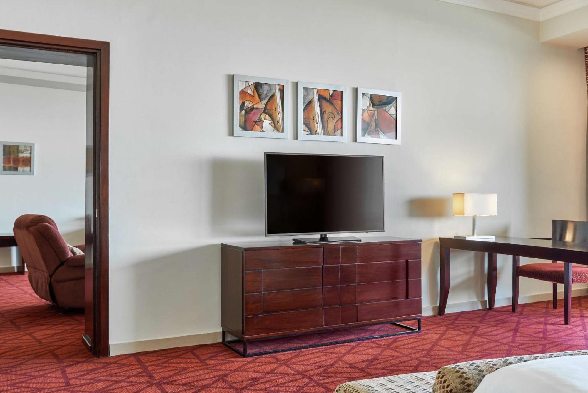 Suite med terrasse og tilgang til lounge