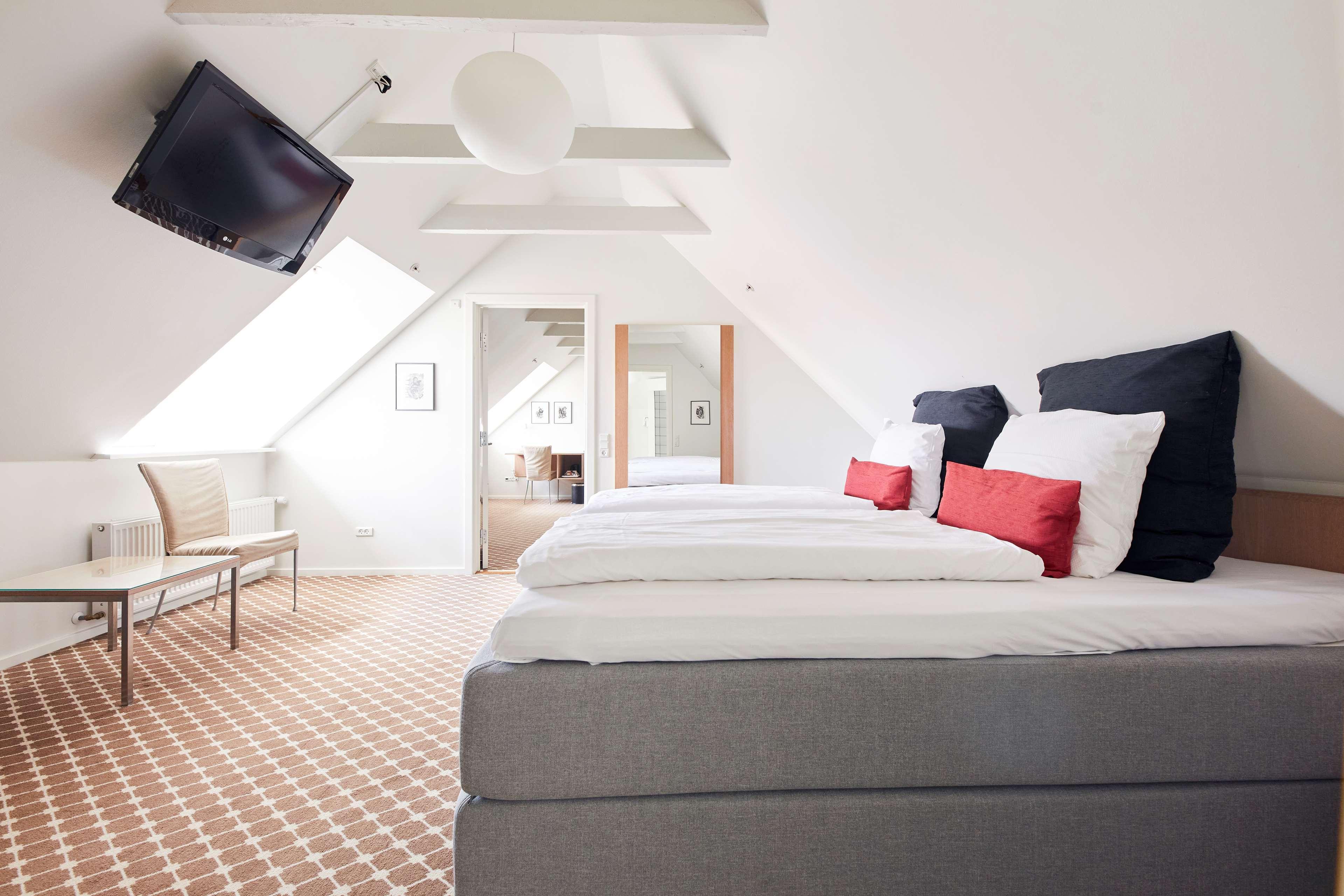 Suite med king-size-seng og boblebad