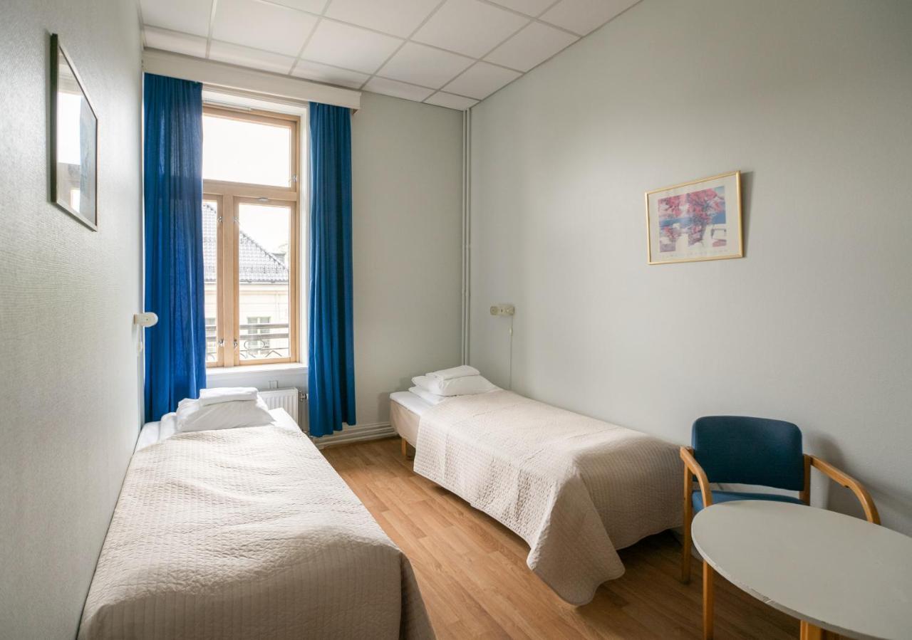 Tomannsrom Budget med felles bad