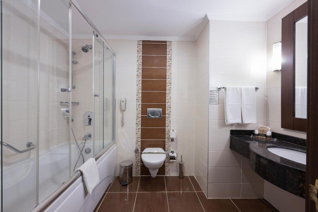 Trebäddsrum Deluxe Standard med stadsutsikt