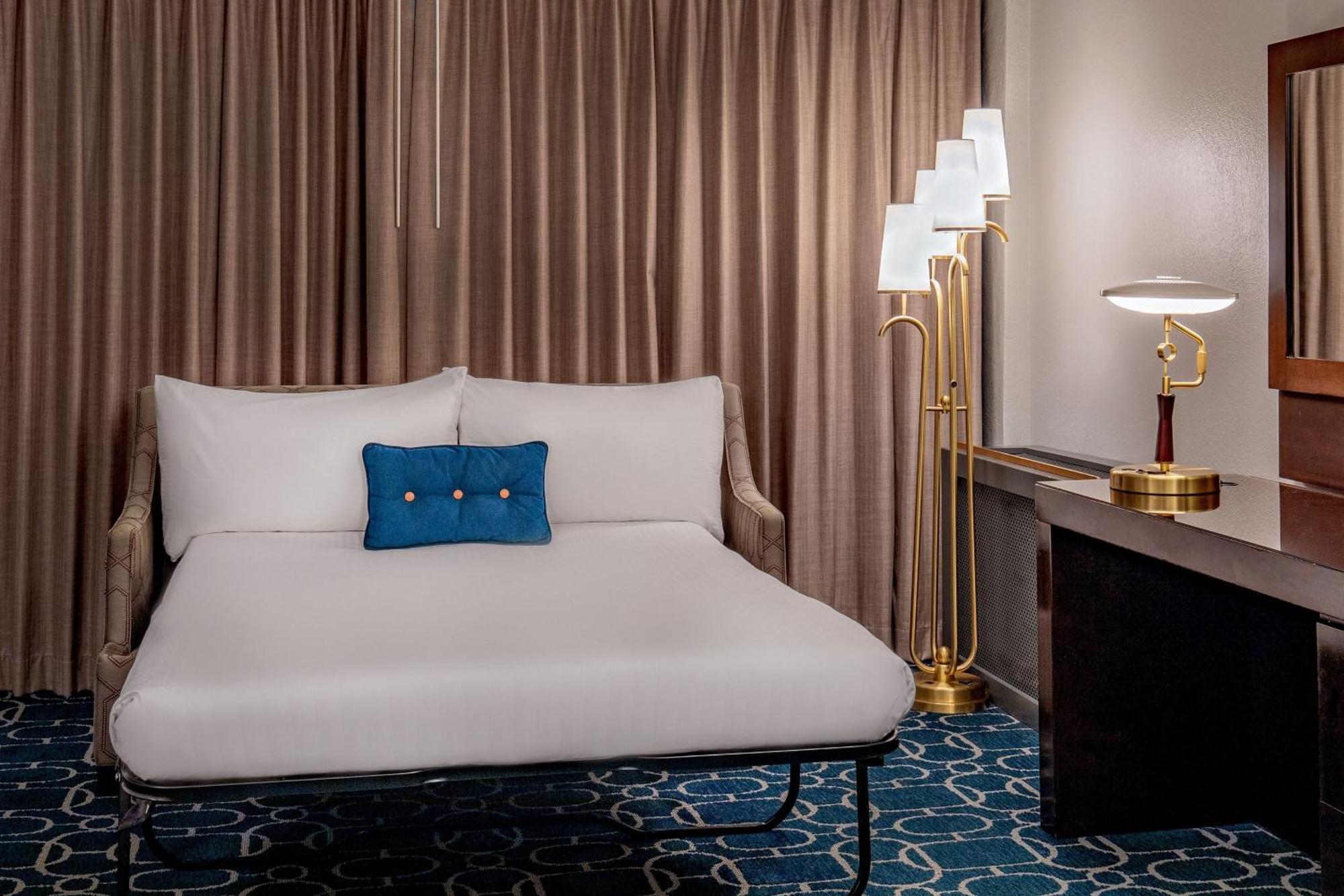 Larger Guest room, 1 King, Sofa bed, Urban view, Corner room (Mobility Accessible w/ Tub)
