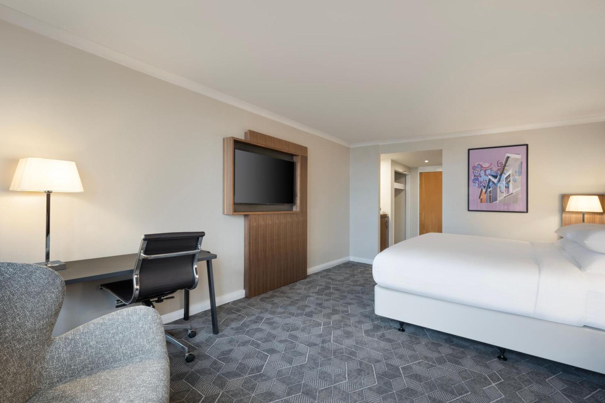 Rom Executive med king-size-seng og salongadgang