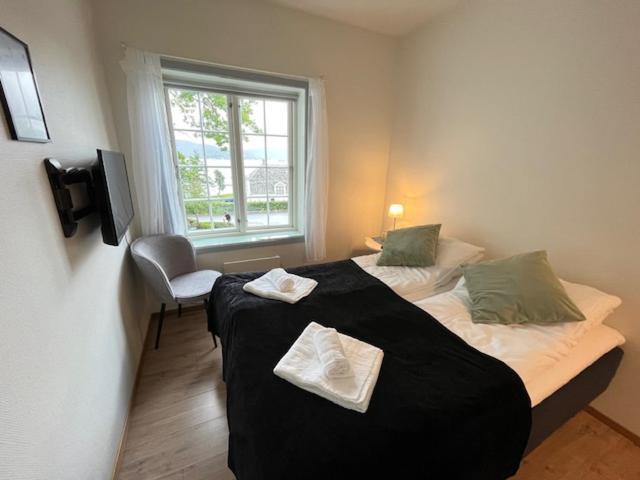Tomannsrom med sjøutsikt