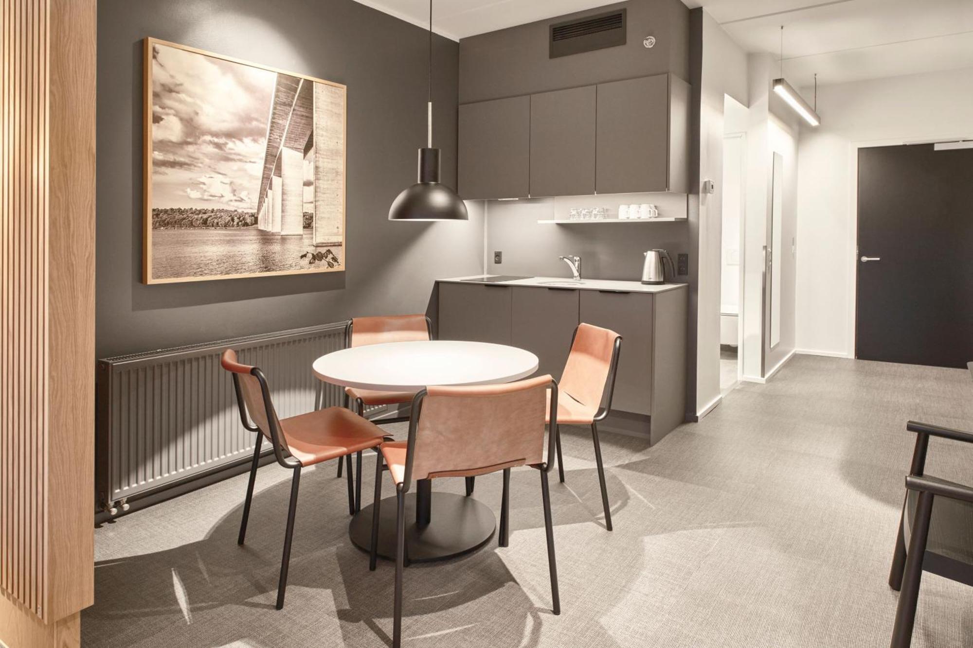 Larger Family Studio with One King and Non-Private Sofa Bed