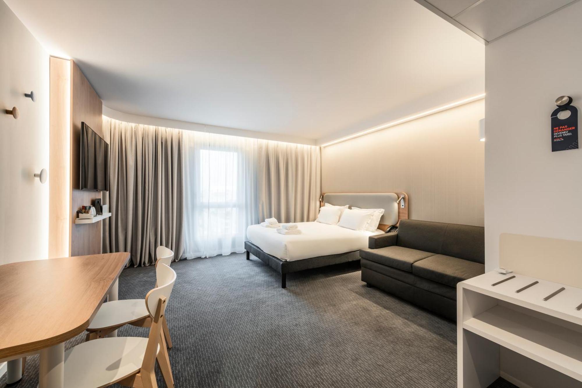 Queen Suite with Sofa Bed and Kitchenette - City View