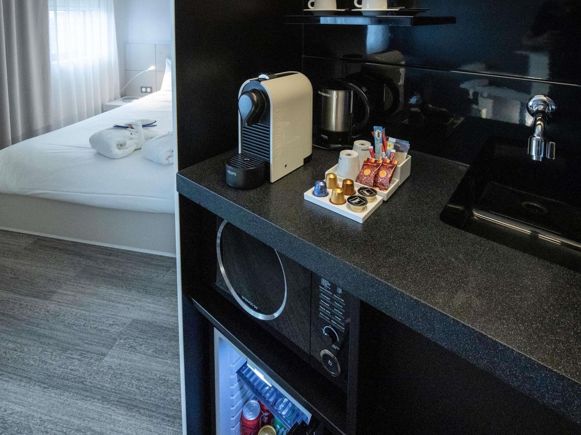 Executive Suite with One Double Bed and One Single Bed