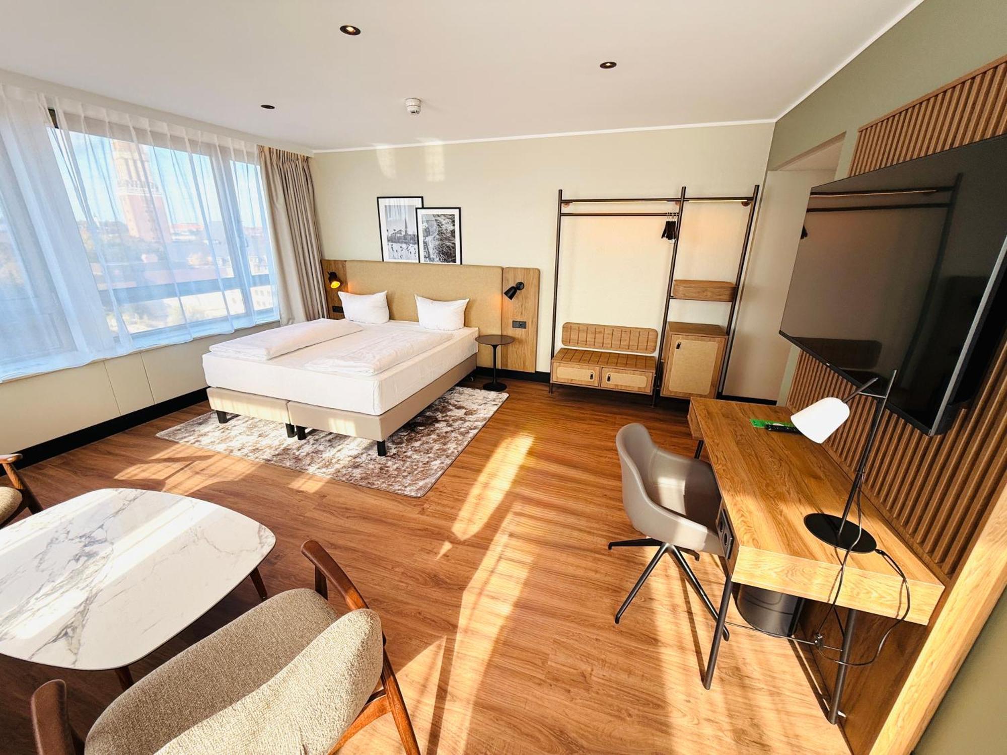 Standard Room – 1 King Bed 2 Sofa Beds