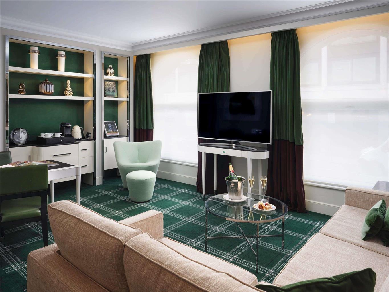 Deluxe King Suite Separate Living Room Sofa Bed