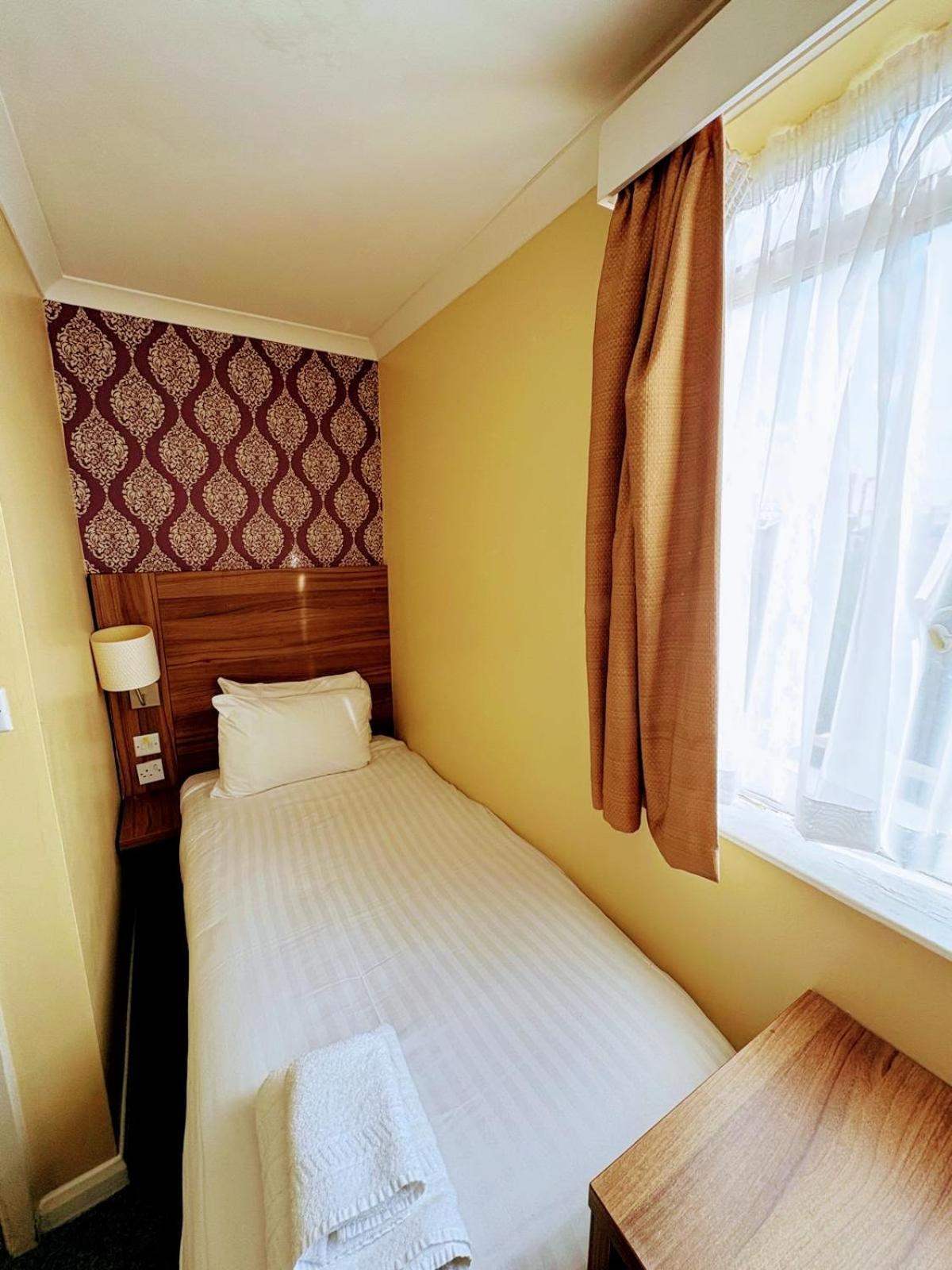 Budget - Yhden hengen huone