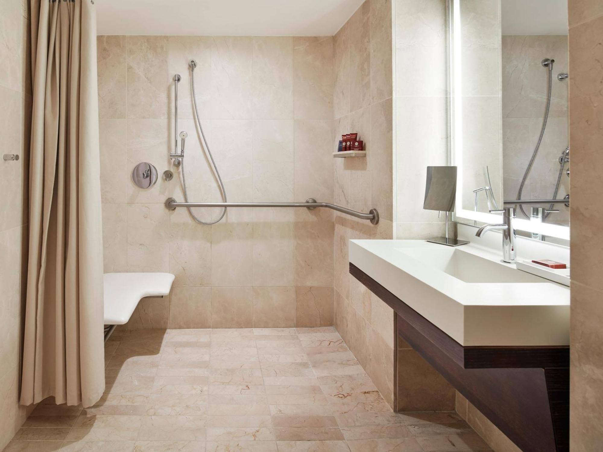 Deluxe Suite Two Double Beds Roll Shower Mobility Access