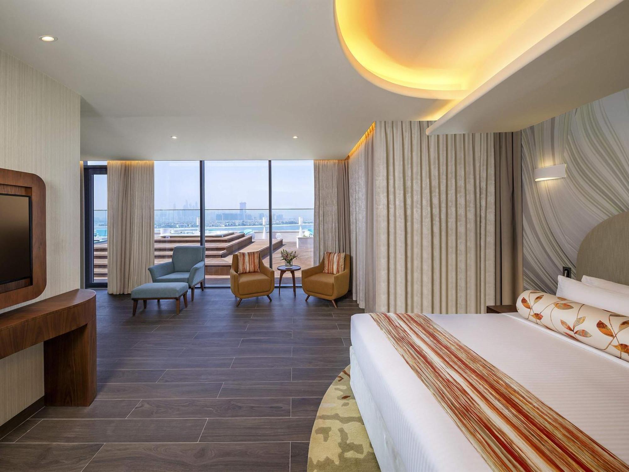 Svit Penthouse King med takterrass och utsikt över palmerna och havet – tillgång till Club Lounge/stranden