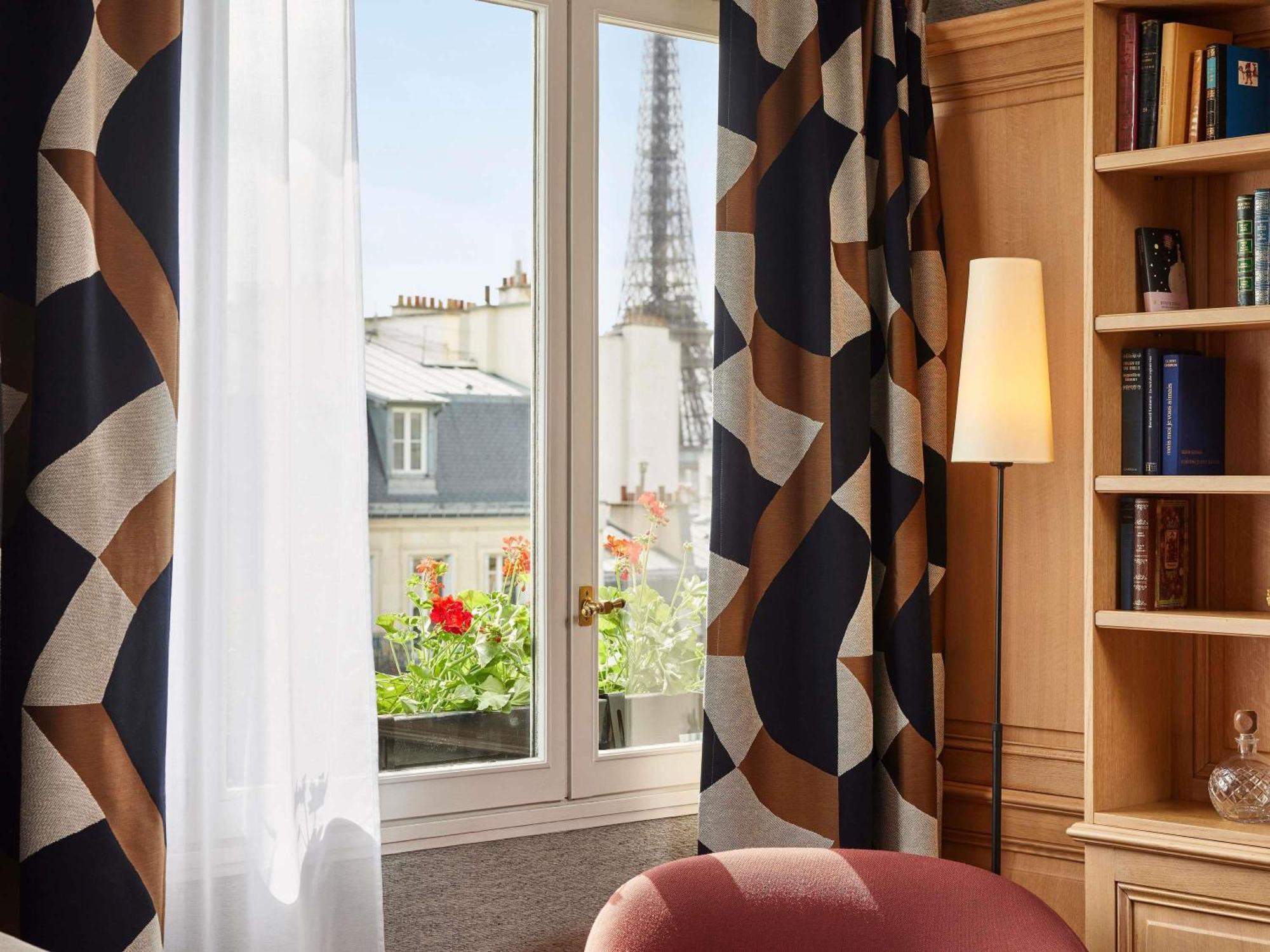 Two-Bedroom Eiffel Family Suite One King Bed One Queen Bed Eiffel Tower View