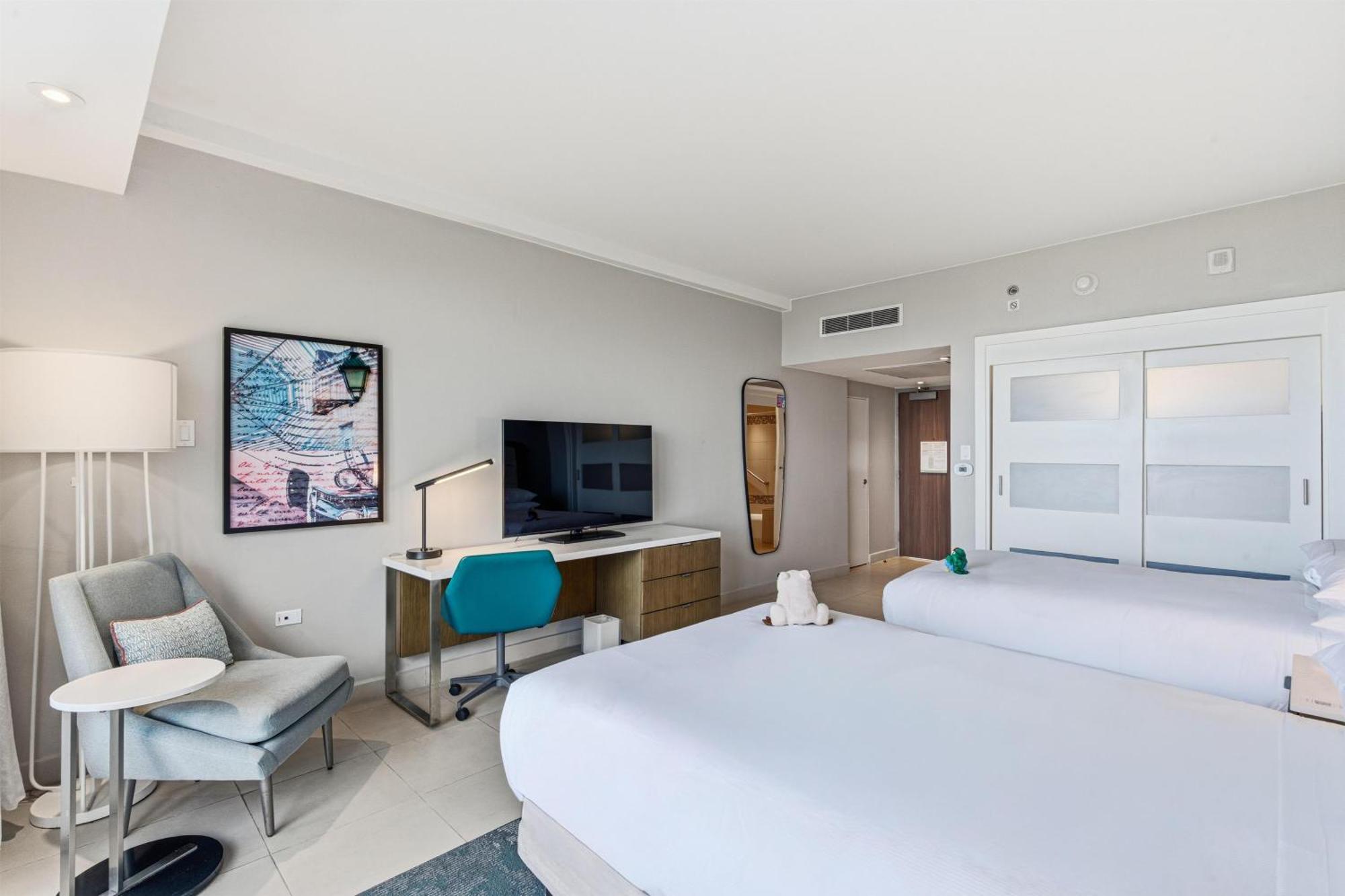 Premium Family Room One King Bed Two Double Beds Garden View