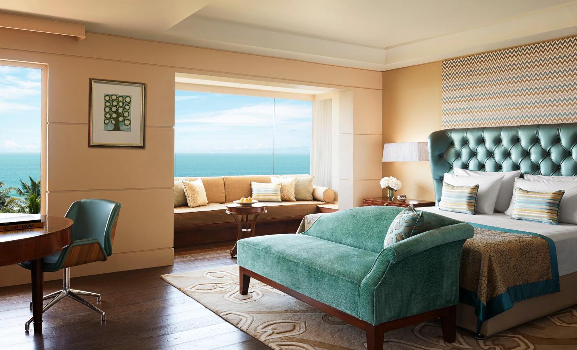 Rom Taj Club med king-size-seng og havutsikt
