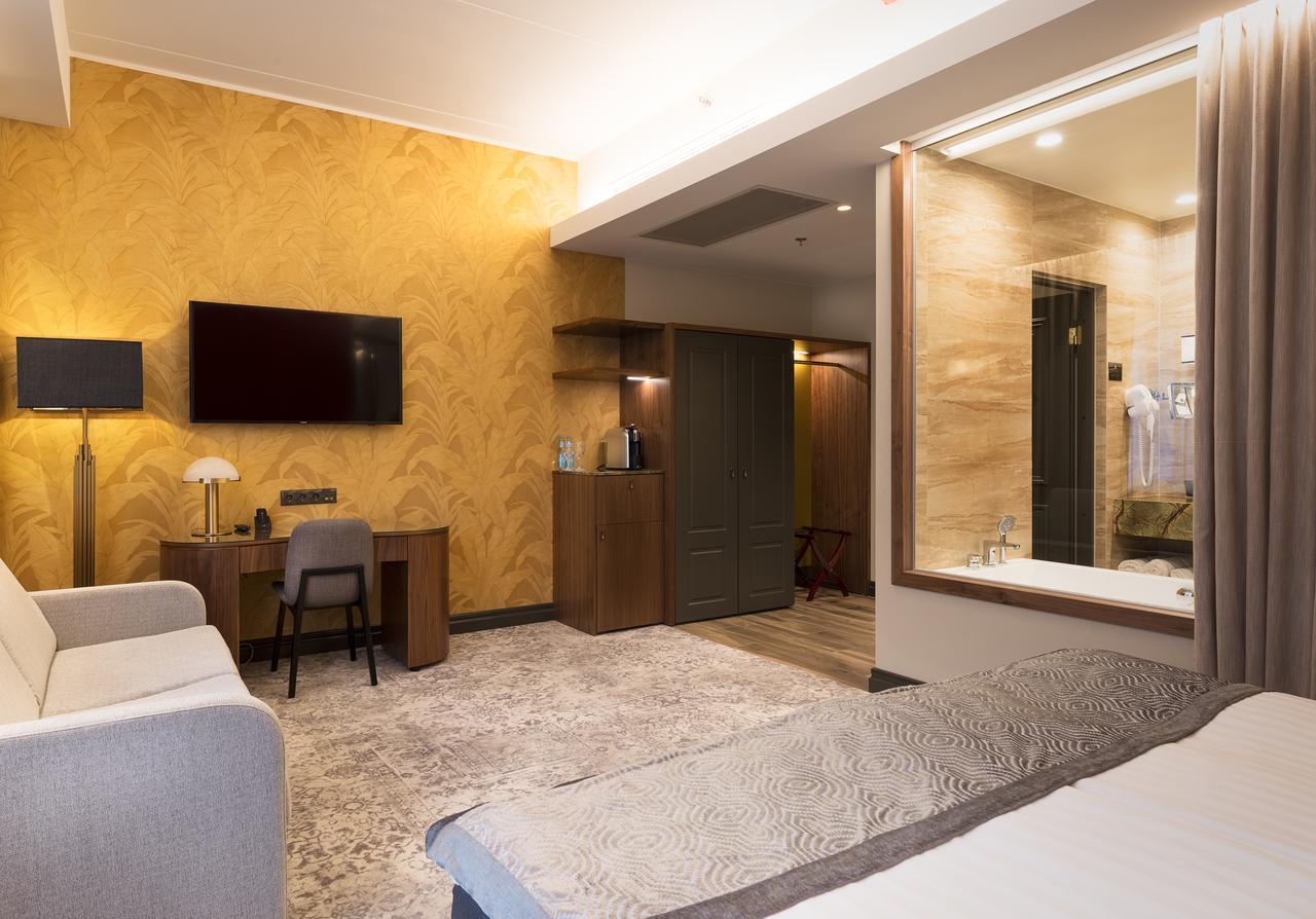 Deluxe-huone - Sis. pääsyn V Spa -vesi- ja saunaosastolle