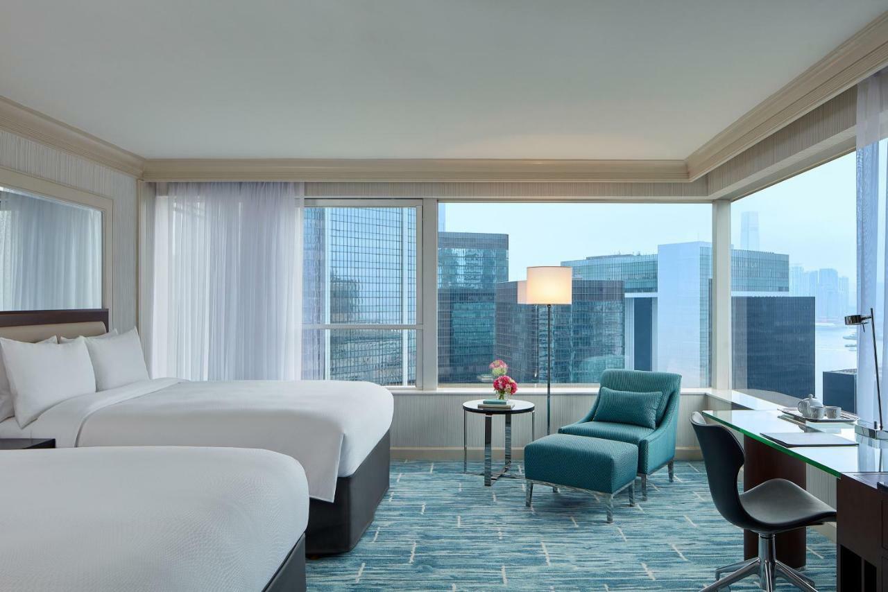 Svit Hong Kong med två dubbelsängar och tillgång till Executive Lounge